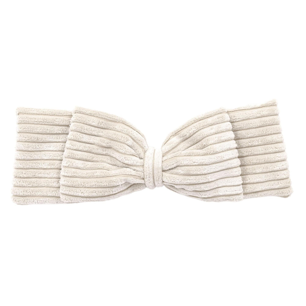 3. Close-up of vanilla corduroy bow detail from baby nest, highlighting ribbed texture
