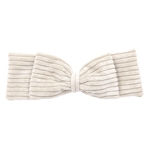 3. Close-up of vanilla corduroy bow detail from baby nest, highlighting ribbed texture
