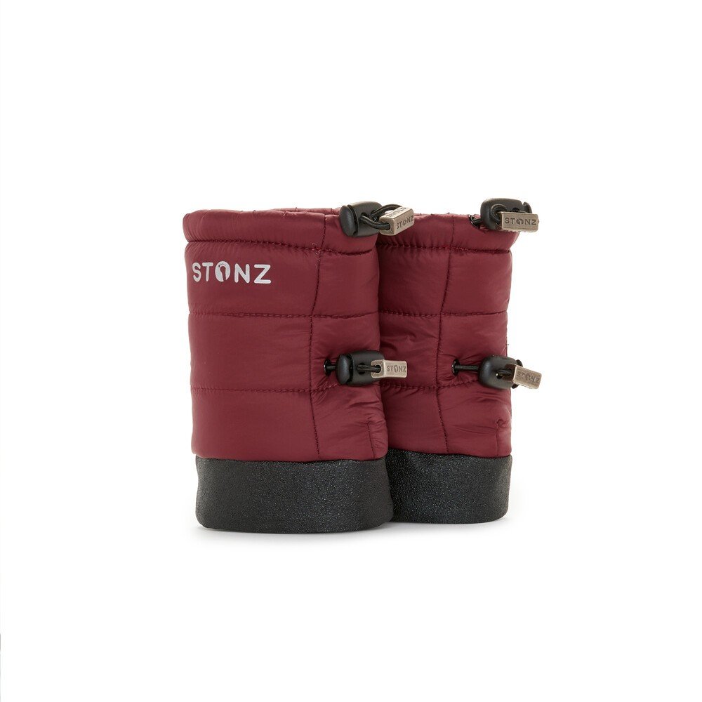 2. Burgundy Stonz Puffer Booties with black soles and elastic straps in studio setting