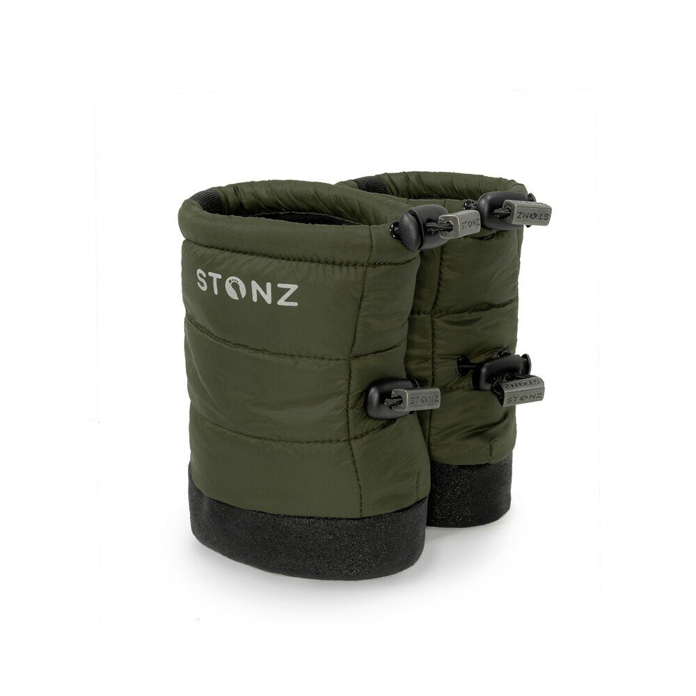 2. Green Stonz Puffer Booties with black soles and elastic straps in studio setting