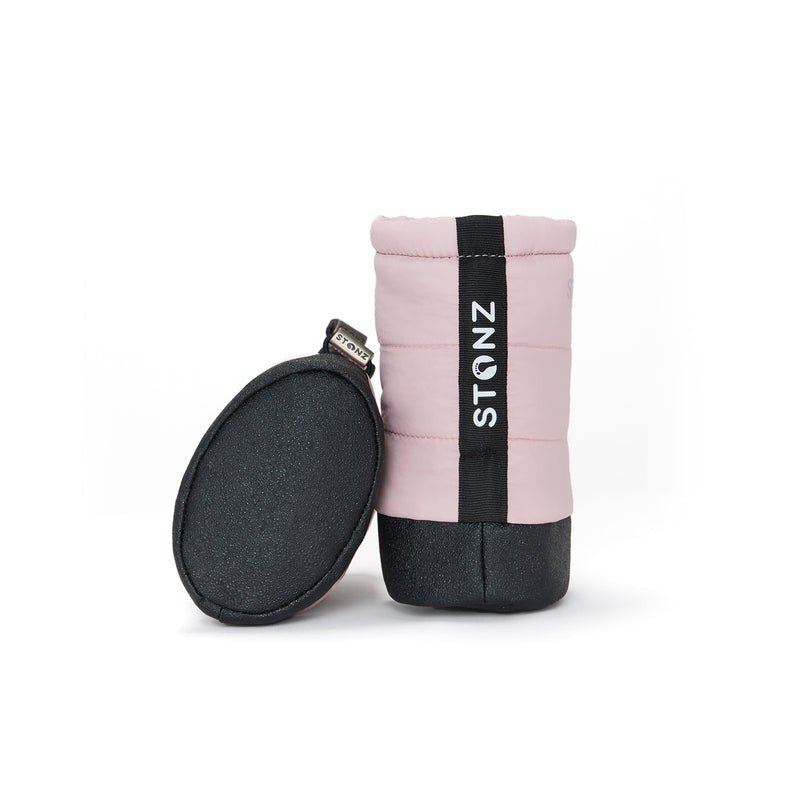 3. Pink Stonz Puffer Booties with black soles and logo patch shown from side