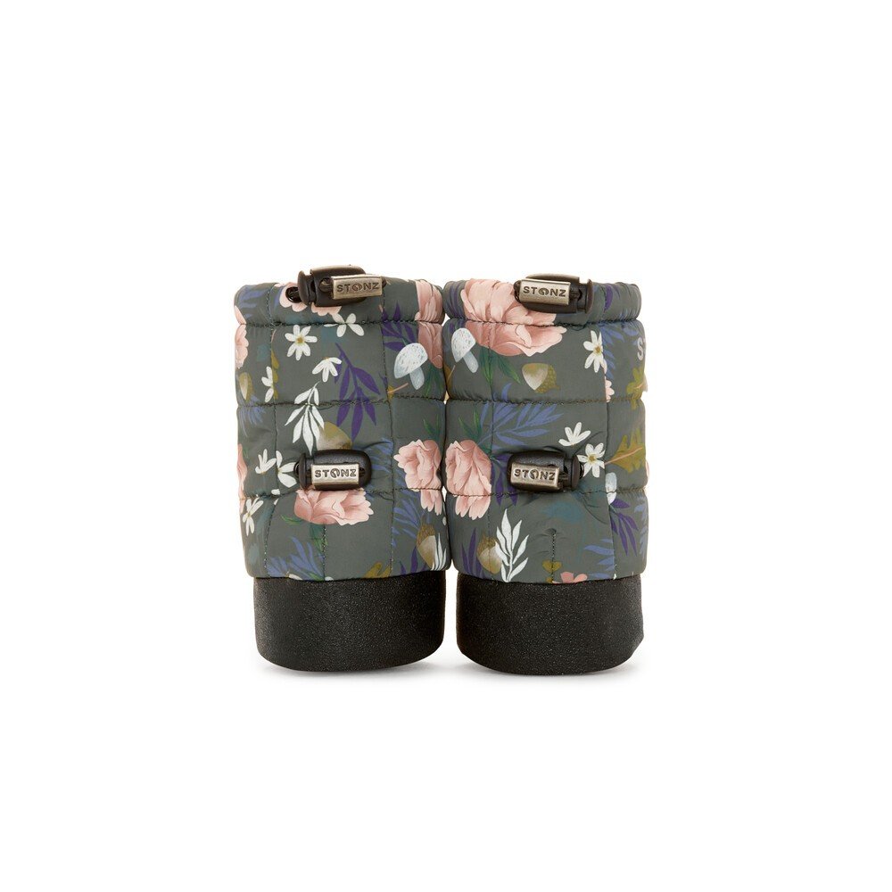 2. Floral print Stonz Puffer Booties with black soles and elastic straps in studio setting