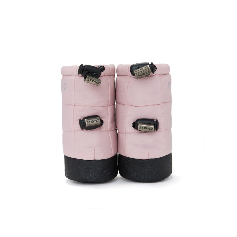 2. Pink Stonz Puffer Booties with black soles and elastic straps in studio setting