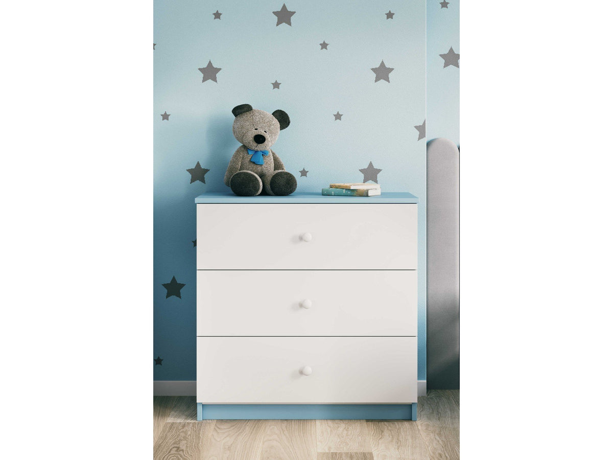 9. Babydreams chest of drawers with blue accents in a child's room with star wallpaper