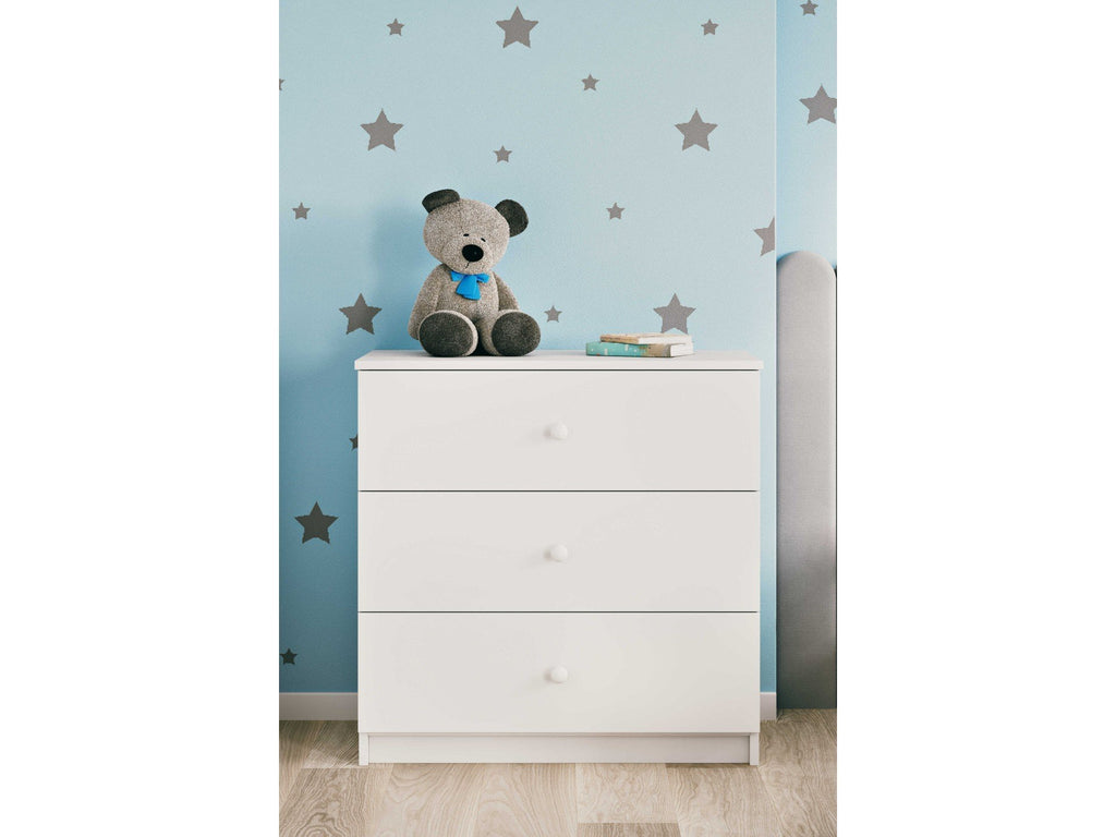 12. Babydreams chest of drawers in a child's room with star wallpaper and a teddy bear on top
