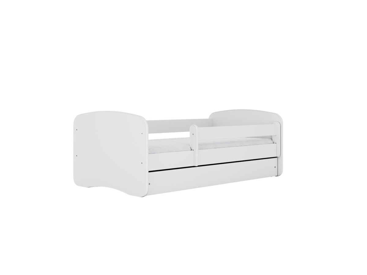 2. White children's bed with guardrail and storage drawer, shown in a studio setting