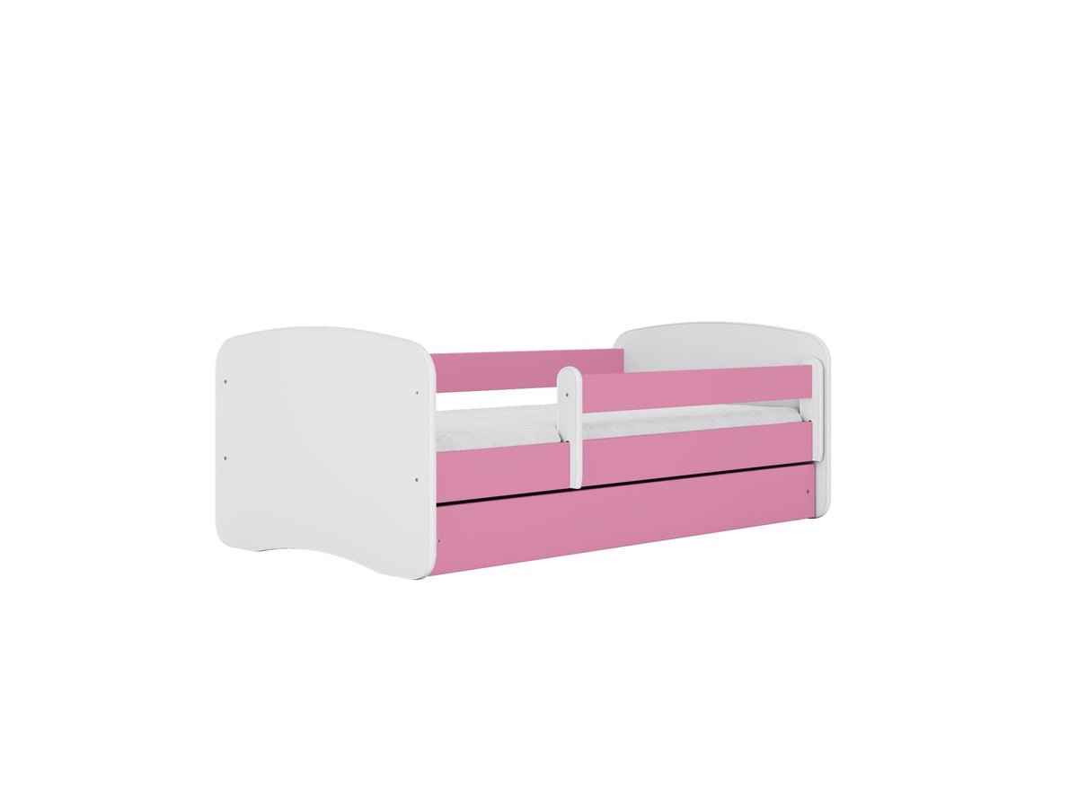 2. Pink and white children's bed with guardrail and storage drawer, shown in a studio setting