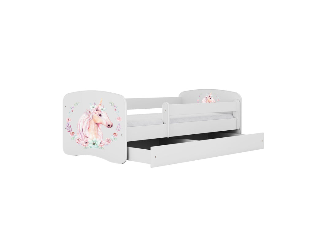 3. White children's bed with unicorn design, shown with open drawer for storage