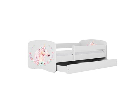 3. White children's bed with unicorn design, shown with open drawer for storage