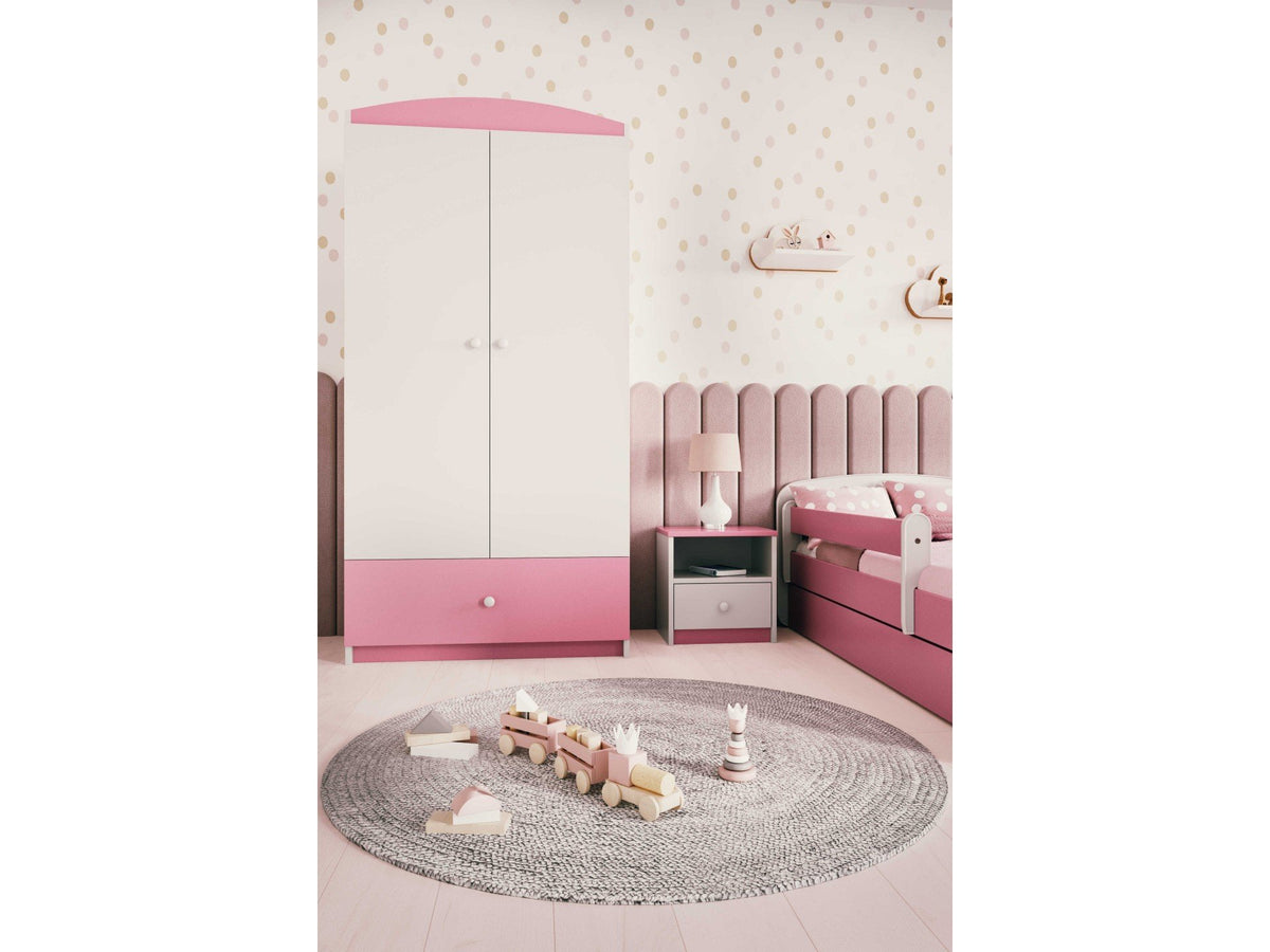 1. Pink and white Babydreams wardrobe in a child's room with matching decor
