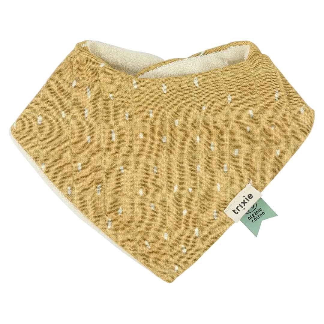 2. Solid mustard yellow bandana bib with white speckled pattern, made from organic cotton muslin by Trixie Baby