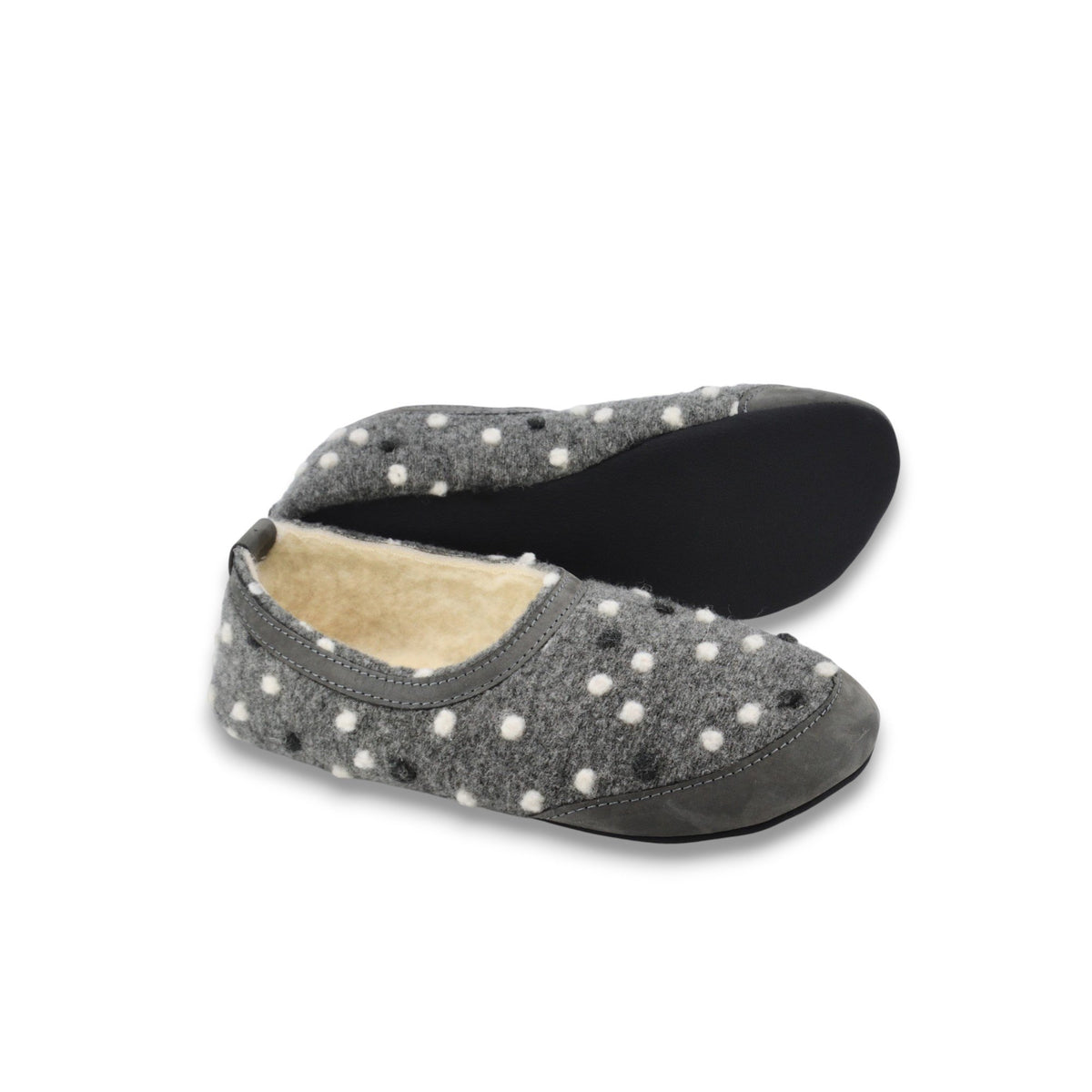 3. Grey wool slipper with white dots and lambswool lining, one slipper showing sole, on white background