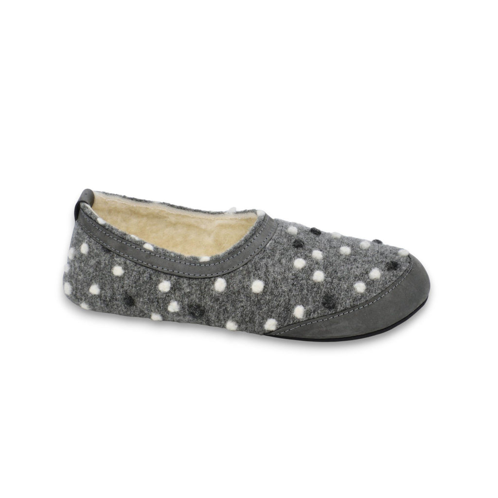1. Grey wool textile slipper with white dots and lambswool lining, side view on white background