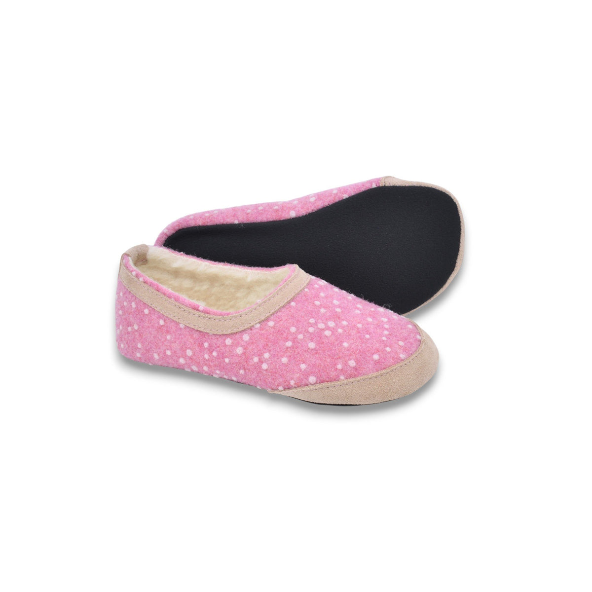 2. Kids' pink felt slippers with white dots, one showing black sole, on white background