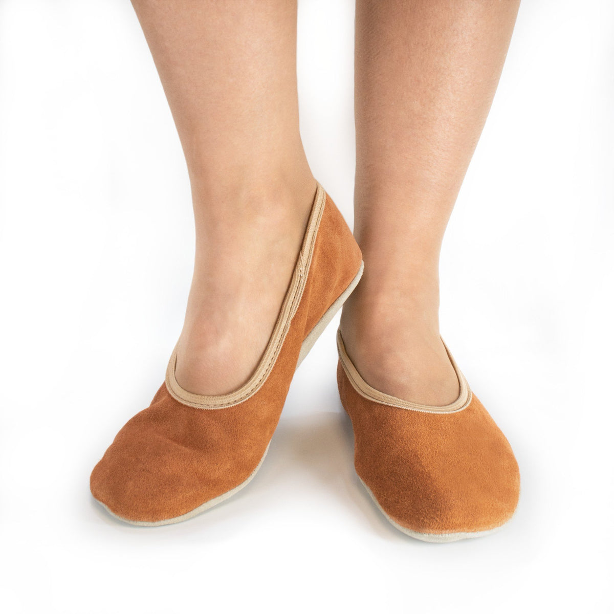 1. Women's barefoot slippers in terracotta by Hip-Hop, shown worn indoors, highlighting comfort and natural foot positioning