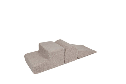 2. Light grey corduroy children's playset with three elements resembling steps and a ramp, designed for creative play and development, shown on a white background