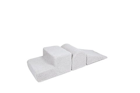 2. Off-white corduroy children's playset with three modular shapes on a white background, designed for creative play and easy cleaning with removable covers.