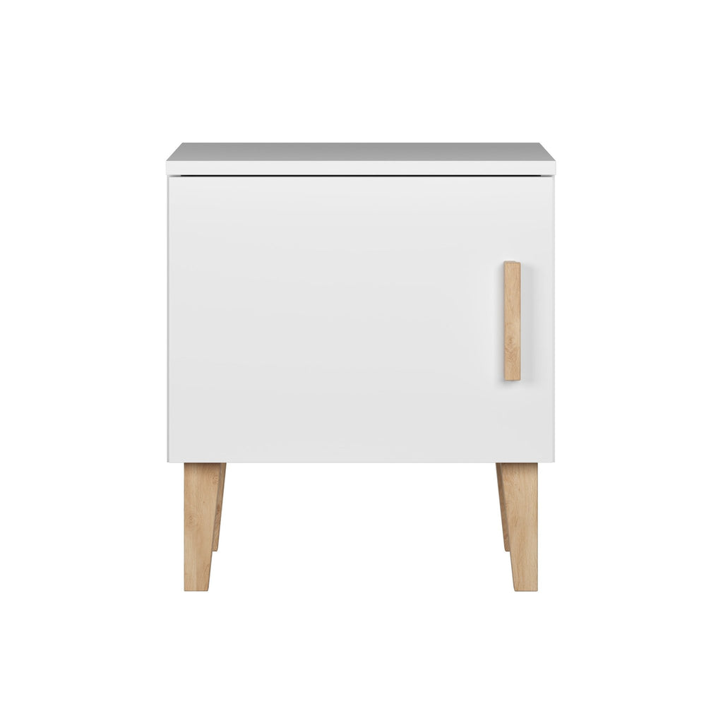2. Front view of Kocot Kids Kubi white bedside table with solid oak legs and handle-free design in studio setting
