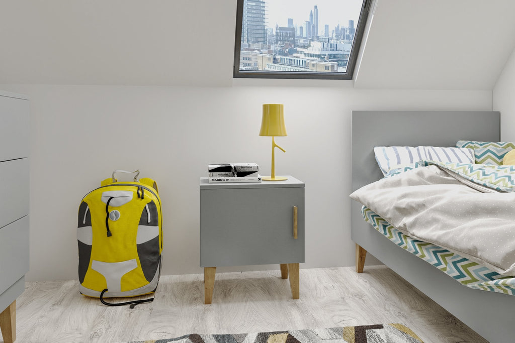 1. Grey bedside table with solid oak legs in bright attic bedroom with city view