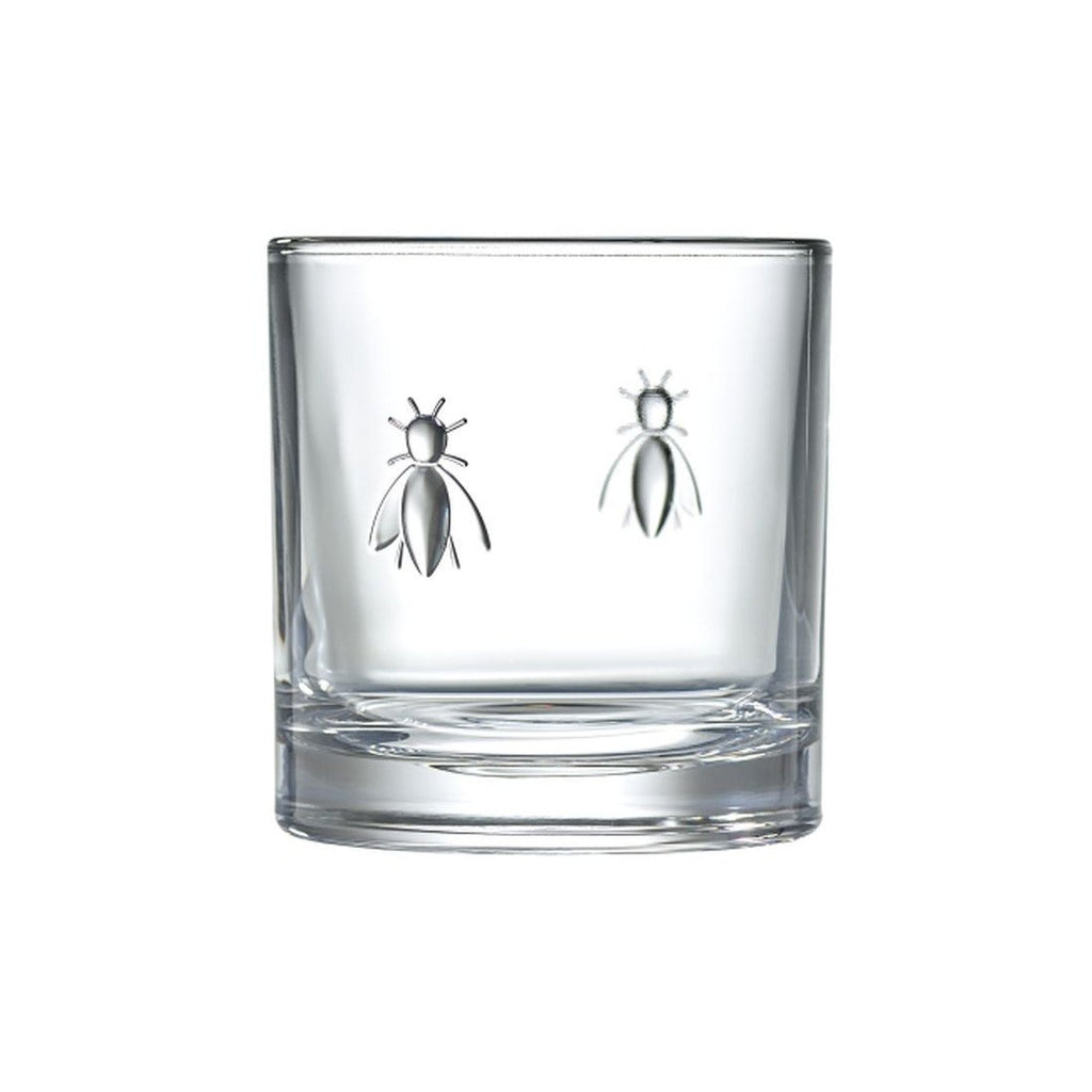 3. Close-up of a single La Rochère Bee Whiskey Glass with embossed bee design, highlighting the intricate detail and transparent glass material