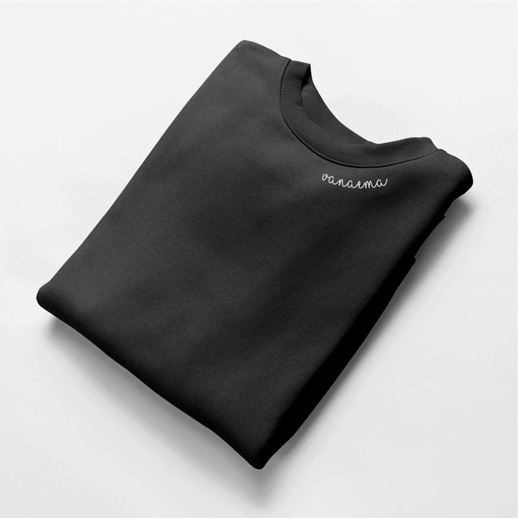 4. Folded black Beebila 'Vanaema' sweatshirt with embroidered collar, flat lay