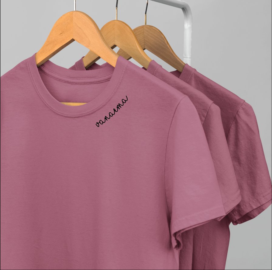 3. Trio of Beebila embroidered collar organic cotton t-shirts in mauve on hangers, highlighting black embroidery