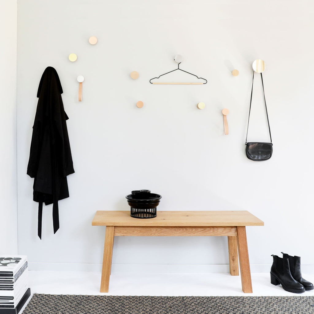 1. Lifestyle image of 5mm Paper Beech Wood & Aluminium Wall Hooks in a modern interior setting
