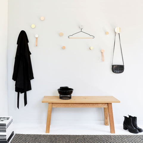1. Lifestyle image of 5mm Paper Beech Wood & Aluminium Wall Hooks in a modern interior setting