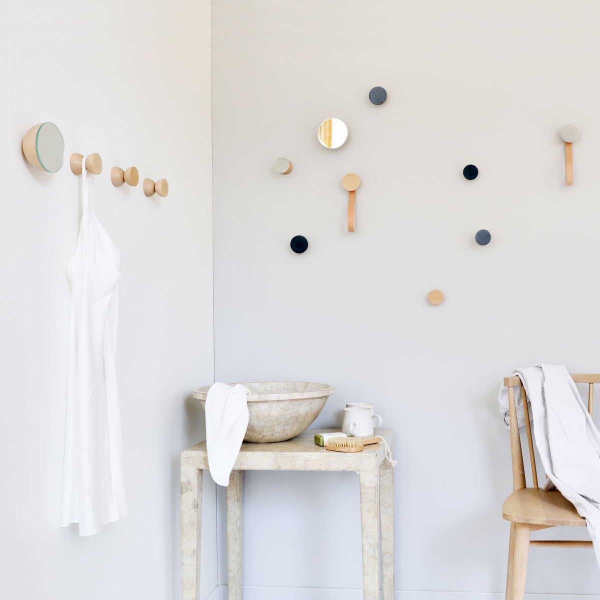 2. Lifestyle image of 5mm Paper wall hooks in a bathroom setting, displaying versatility and modern design