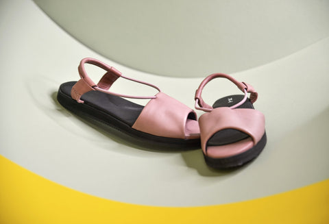 2. Lifestyle image of pink Berlin sandals by Omaking, showcasing ergonomic design and leather upper