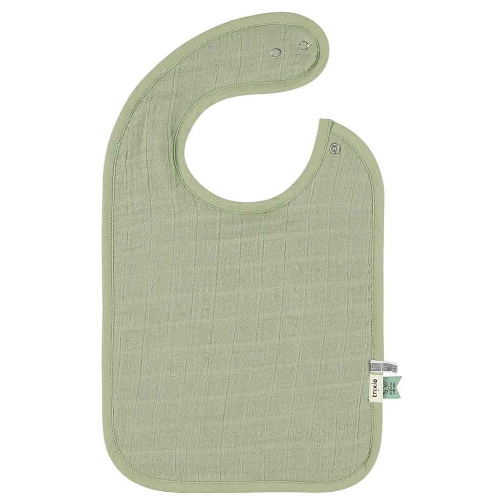 2. Single Trixie Baby bib in solid light green muslin with adjustable snaps, shown on a white background