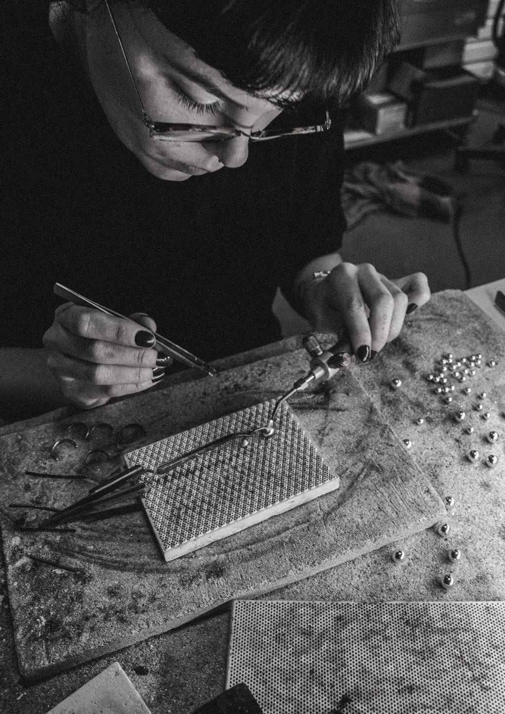 9. Artisan working on NO MORE Big Bomb Multisize Ring in silver, emphasizing sustainable and handmade production