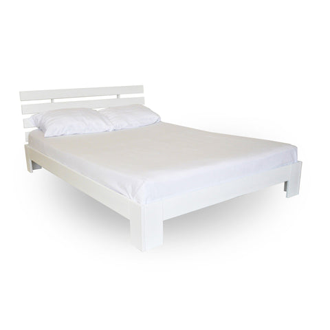 1. White Birch Bed Tango Plus with slatted headboard and white bedding on a clean white background