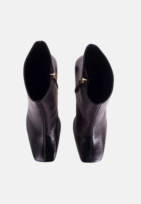 3. Top view of black goat leather Senna boots showing square toe and gold zipper detail