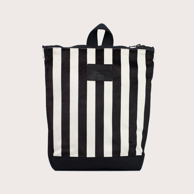 4. Studio shot of Muni black and white striped kids backpack with velvet top and polyester bottom