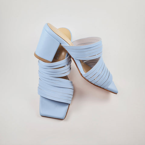 5. Close-up of light blue leather sandals by Daz Studio, focusing on leather sole and squared toe