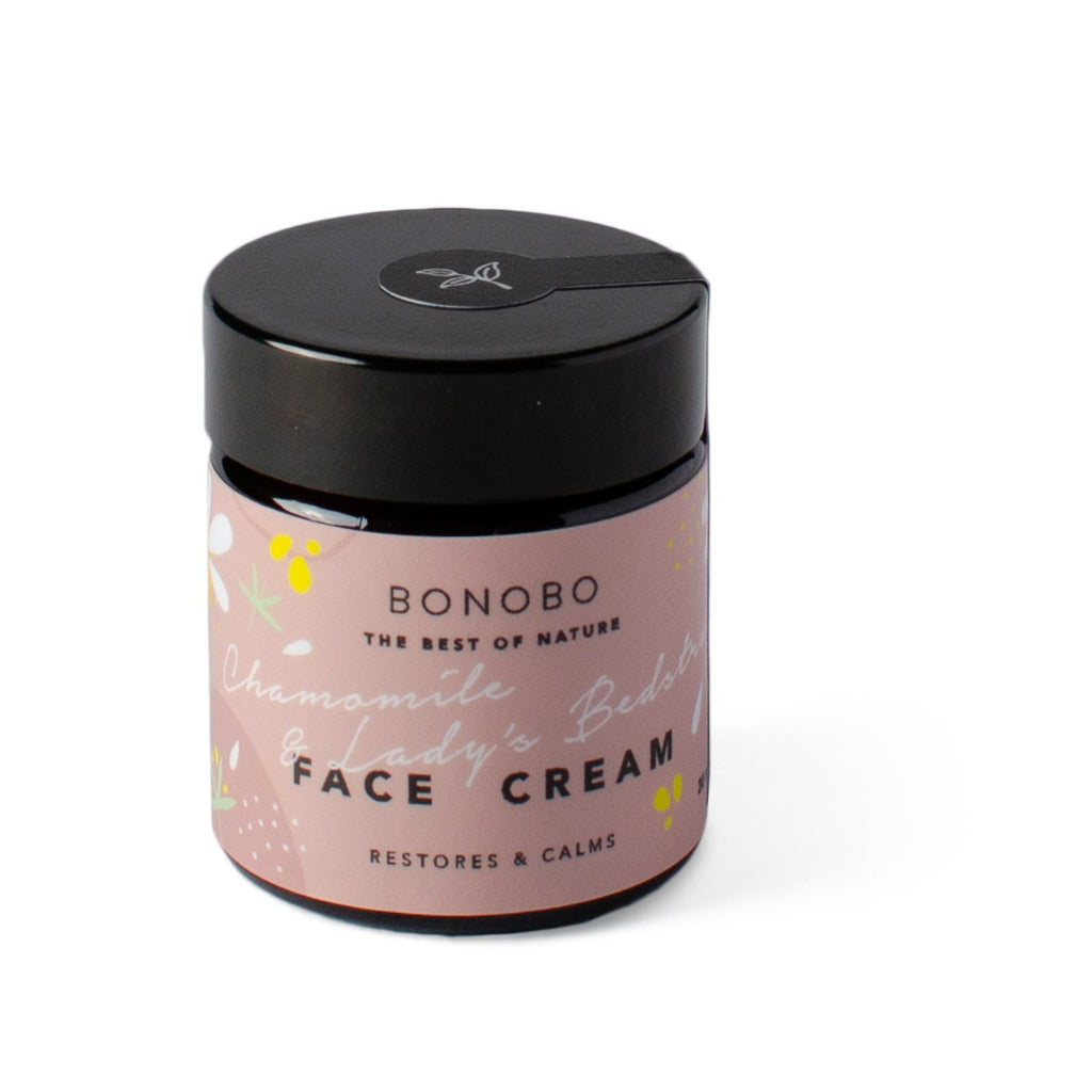 2. BONOBO Chamomile & Lady’s Bedstraw Face Cream jar with packaging, displayed on a marble surface
