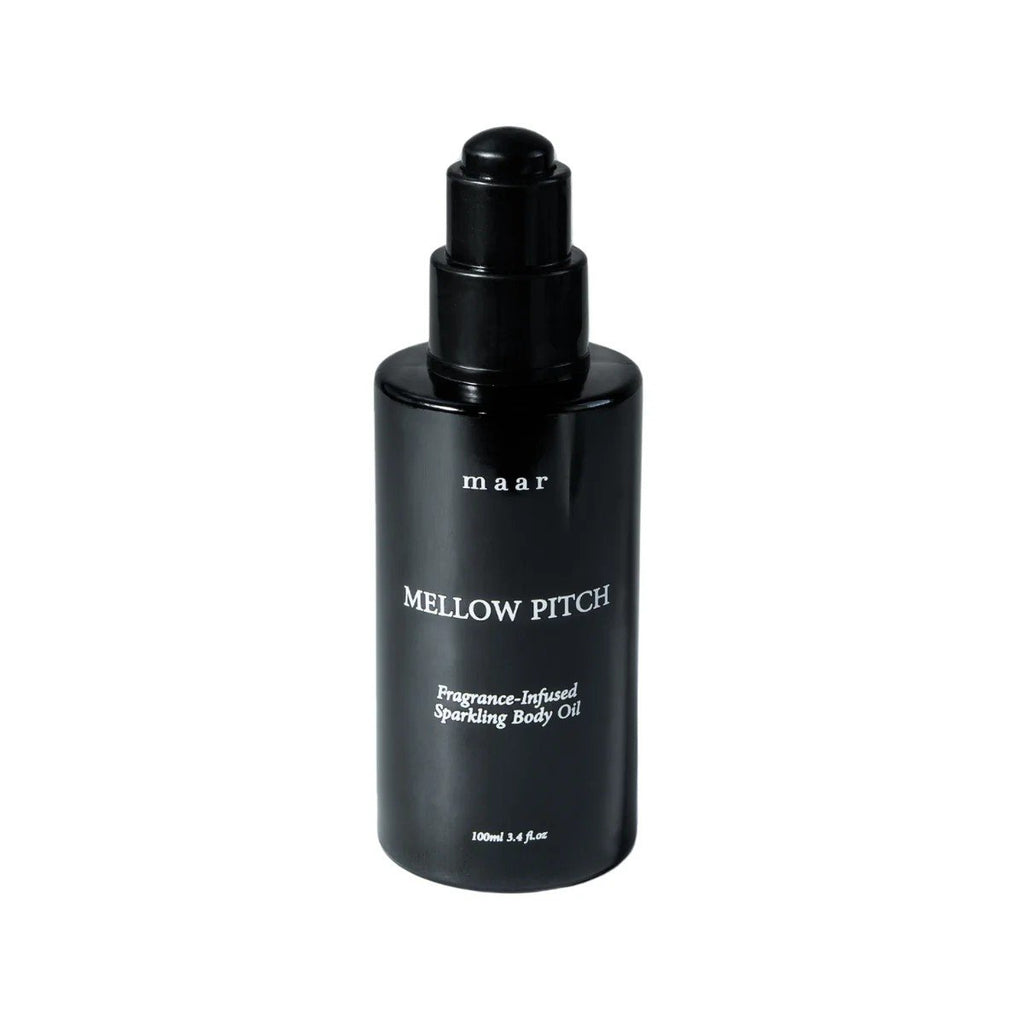 2. Black glass bottle of Mellow Pitch body oil by maar with dropper, on white background