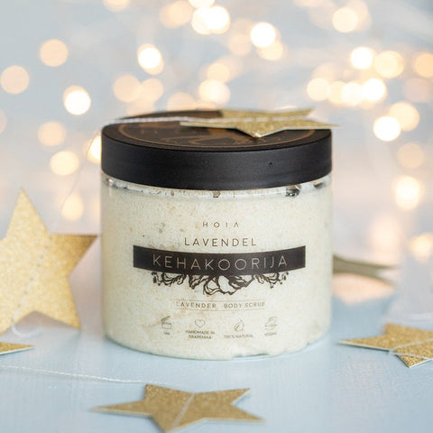 1. HOIA homespa Lavender Body Scrub, 200 ml, shown in a festive setting with decorative stars, highlighting the product's luxurious and natural appeal