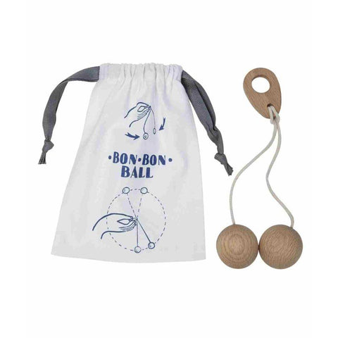 4. Flat lay of Wooden Story Bon Bon Ball toy with natural cotton bag featuring blue illustrations and text