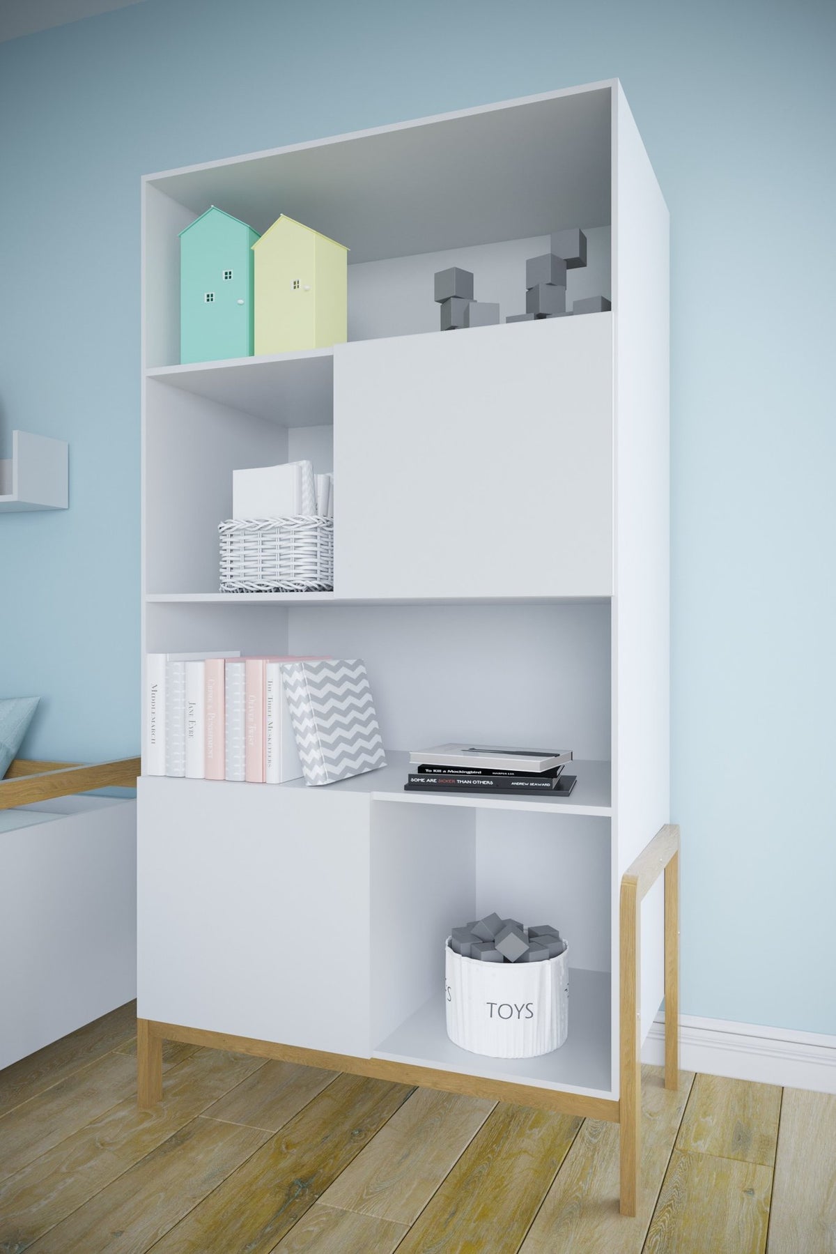 1. Kocot Kids Victor bookshelf in a child's room with light blue walls, styled with books and decorative items