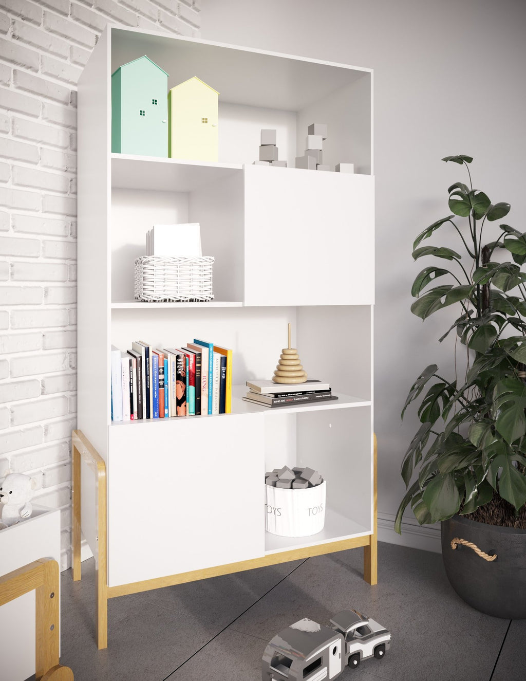 1. Kocot Kids Victor bookshelf styled with books and toys, placed in a contemporary room with a potted plant