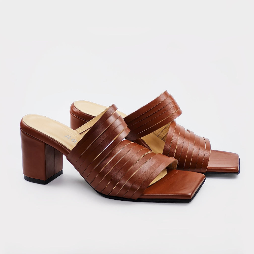 2. Side view of Daz Studio brown strappy leather sandals with block heel and squared toe