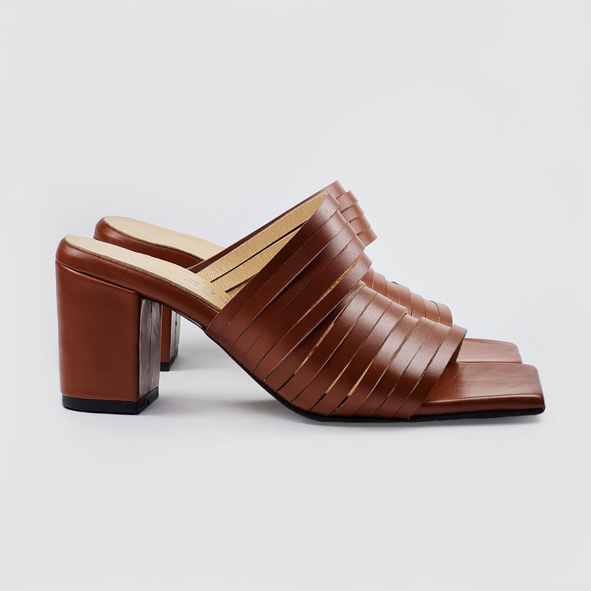 4. Profile view of Daz Studio brown leather sandals with strappy design and squared toe