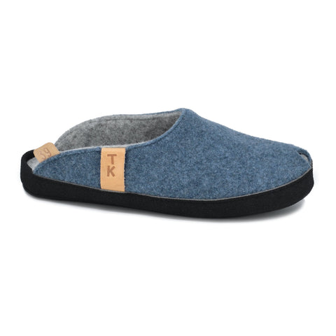 2. Side view of TOKU Brussels blue slippers with arch support and black microfibre sole, studio setting