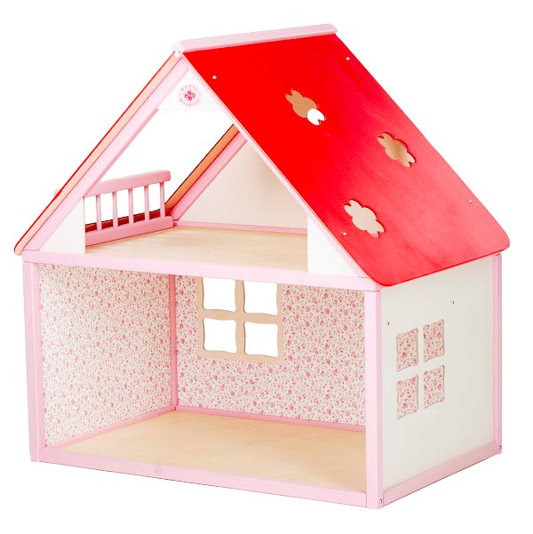 2. Front view of ROOSI Traditional Toys pink and white wooden dollhouse with red roof, featuring floral wallpaper interior and window cutouts