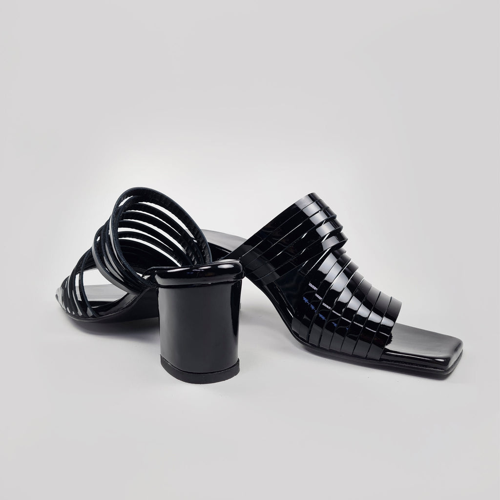 7. Women's black patent leather sandals with block heel, shown from back and side