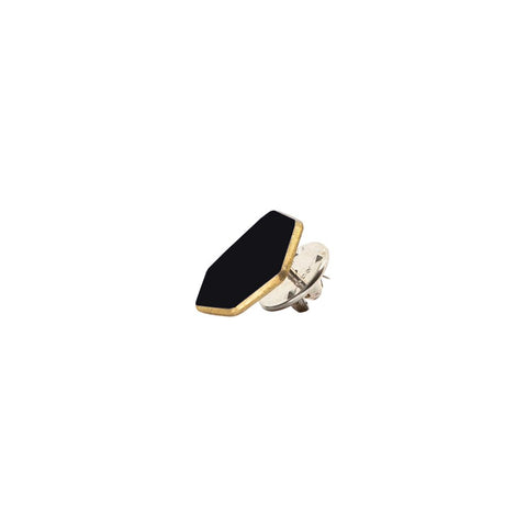 1. Lisa Kroeber Jewellery Pin Mini in black, crafted from powder-coated brass and sterling silver, shown in studio setting