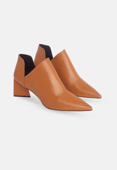 2. Pair of women's brown leather ankle boots with pointed toe and block heel on white background