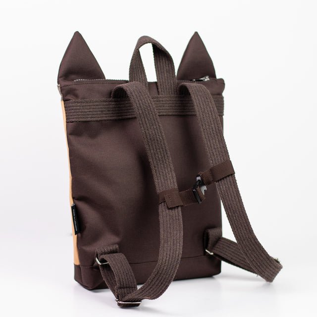 9. Back view of Muni horse backpack in studio, highlighting adjustable straps and design
